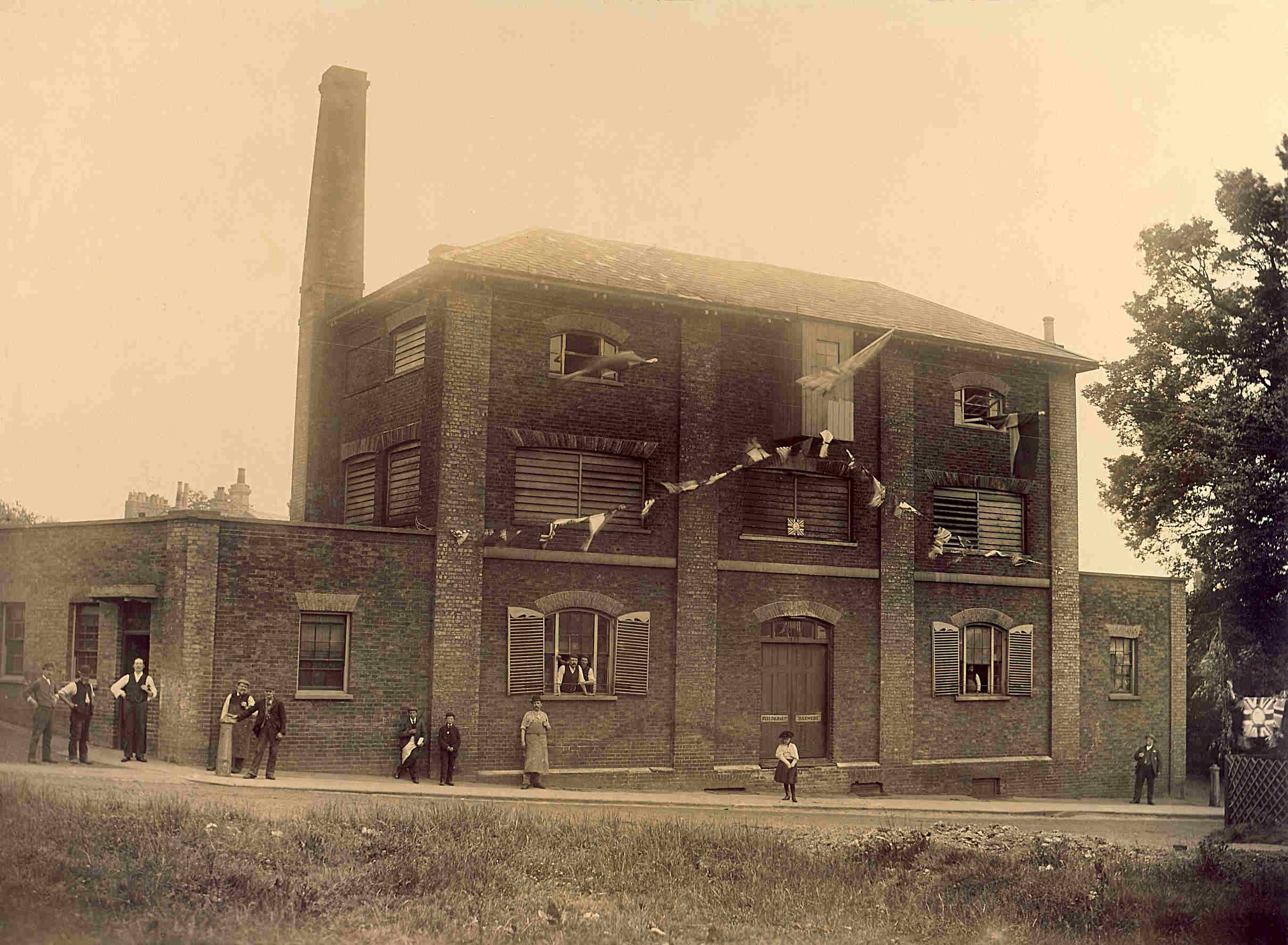 A view of The Fielder & Co Brewery. The decorations of flags suggest it could be decorated for Empire Day, or for the coronation of Edward VII in 1902.